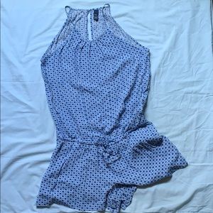Blue and white geometric patterned romper.